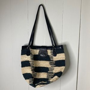 Vintage African finely woven raffia bag w leather trim .